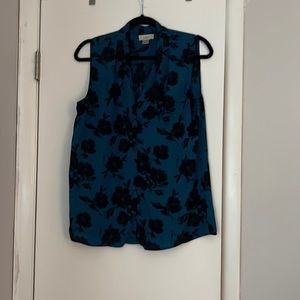 Sleeveless shell in black and teal floral pattern EUC